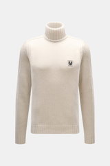 Belstaff Rollkragenpullover 'Watch' creme, frontal fotografiert, reine Wolle, weicher Griff, grobes Strickbild, Rippstrick-Elemente, Slim Fit, Rollkragen, BELSTAFF-Weblabel auf der Brust, flexible Rippbündchen.