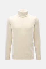 Drumohr Cashmere Rollkragenpullover creme, frontal fotografiert, reiner Cashmere, sehr weicher Griff, mittelgrobes Strickbild, Slim Fit, Rollkragen, flexible Rippbündchen.