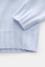 Close-up view of the sleeve and bottom hem of the Fioroni Cashmere Rundhalspullover graubraun meliert, showcasing its flexible ribbed cuffs and medium-fine knit texture.

<p>Souveräne Eleganz in ihrer luxuriösesten Form: Der Rollkragenpullover von FIORO