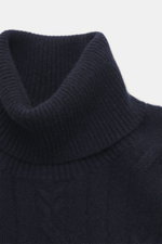 Close-up front view of Fioroni Cashmere turtleneck sweater navy, showcasing pure cashmere, soft touch, cable knit pattern, fine knit texture, slim fit, turtleneck, and flexible ribbed cuffs.
