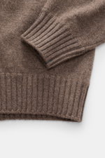 Close-up top view of Fioroni Cashmere Turtleneck Sweater 'Duvet' grey brown mélange showing ribbed cuffs and hem, fine knit pattern, pure cashmere with very soft feel, slim fit, ribbed turtleneck, flexible ribbed cuffs, luxurious warmth with Italian craft