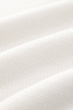 Close-up front view of B.F. Knitwear Merino turtleneck jumper off-white showing pure merino wool, soft feel, semi chunky knit, slim fit, ribbed turtleneck, and flexible ribbed bands.