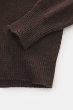 Close-up top-down view of the B.F. Knitwear Cashmere Turtleneck Sweater dark brown, showing elastic rib-knit cuffs and medium-fine knit pattern. Autumnal cashmere by the knitting expert B.F. KNITWEAR: This softly knitted turtleneck sweater is the perfect 