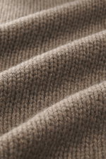 Close-up front view of B.F. Knitwear Cashmere turtleneck sweater taupe melange showing coarse knit texture and soft touch.