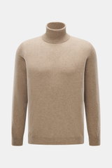 Front view of Aida Barni Cashmere turtleneck sweater beige melange, pure cashmere with soft feel, fine knit pattern, slim fit, close-fitting turtleneck, and flexible ribbed cuffs, Italian knitwear by AIDA BARNI, a warm must-have for autumn/winter.