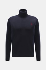 Front view of Ami Paris Merino Turtle Neck Sweater Navy, pure merino wool with soft touch, fine knit, regular fit, narrow turtleneck, logo on chest, ribbed cuffs.