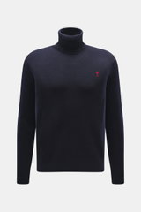 Front view of Ami Paris Merino Turtle Neck Sweater Navy, pure merino wool with soft touch, fine knit, regular fit, narrow turtleneck, logo on chest, ribbed cuffs.