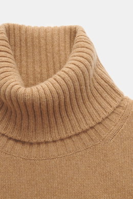 Close-up front view of Ami Paris Cashmere Turtleneck Sweater Light Brown showing fitted turtleneck, medium fine knit, soft touch, ribbed cuffs, cashmere with wool, regular fit, and logo stitching on hem.