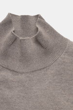 Maison Kitsuné Turtleneck Sweater 'Profile Fox' taupe melange shown from above, knit from pure wool with soft touch, fine knit pattern, regular fit, high collar, and fox stitching. 

<p>Cool essential by MAISON KITSUNÉ: With the typical fox stitching on t