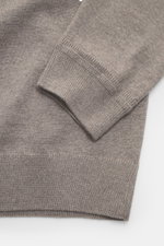 Alt tag (124 characters): Close-up front view of Maison Kitsuné Turtleneck Sweater 'Profile Fox' taupe melange showing knit texture and cuff.

Additional description: 
<p>Cool essential by MAISON KITSUNÉ: With the typical fox stitching on the chest, this 