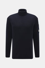 Front view of C.P. Company Turtleneck sweater navy, knit from virgin wool and microfiber, soft feel, medium-fine knit, rib stitch, slim fit, close turtleneck, zippered upper arm pocket, lens detail, flexible rib cuffs.