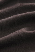 Close-up front view of Kiefermann Merino Fine Knit Sweater "Malt" dark brown showing pure merino wool, super soft touch, very fine knit pattern, slim fit, high crew neckline, elastic sleeve cuffs.