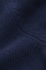 Close-up front view of Bruno Manetti Cashmere turtleneck jumper navy showing medium-fine knit, soft pure cashmere, slim fit, ribbed bands, and close-fitting turtleneck. A timeless winter essential: This elegant turtleneck jumper by BRUNO MANETTI keeps you