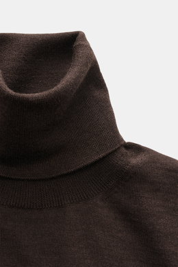 Agnona Turtleneck Sweater Dark Brown shown from a close-up front angle, featuring fine knit, fitted turtleneck, ribbed cuffs, and soft wool, silk, cashmere blend. Stylish layering piece with regular fit and back AGNONA metal label.