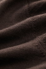 Close-up view of the Agnona Turtleneck Sweater Dark Brown fabric showing its very fine knit pattern, soft touch, and ribbed texture.