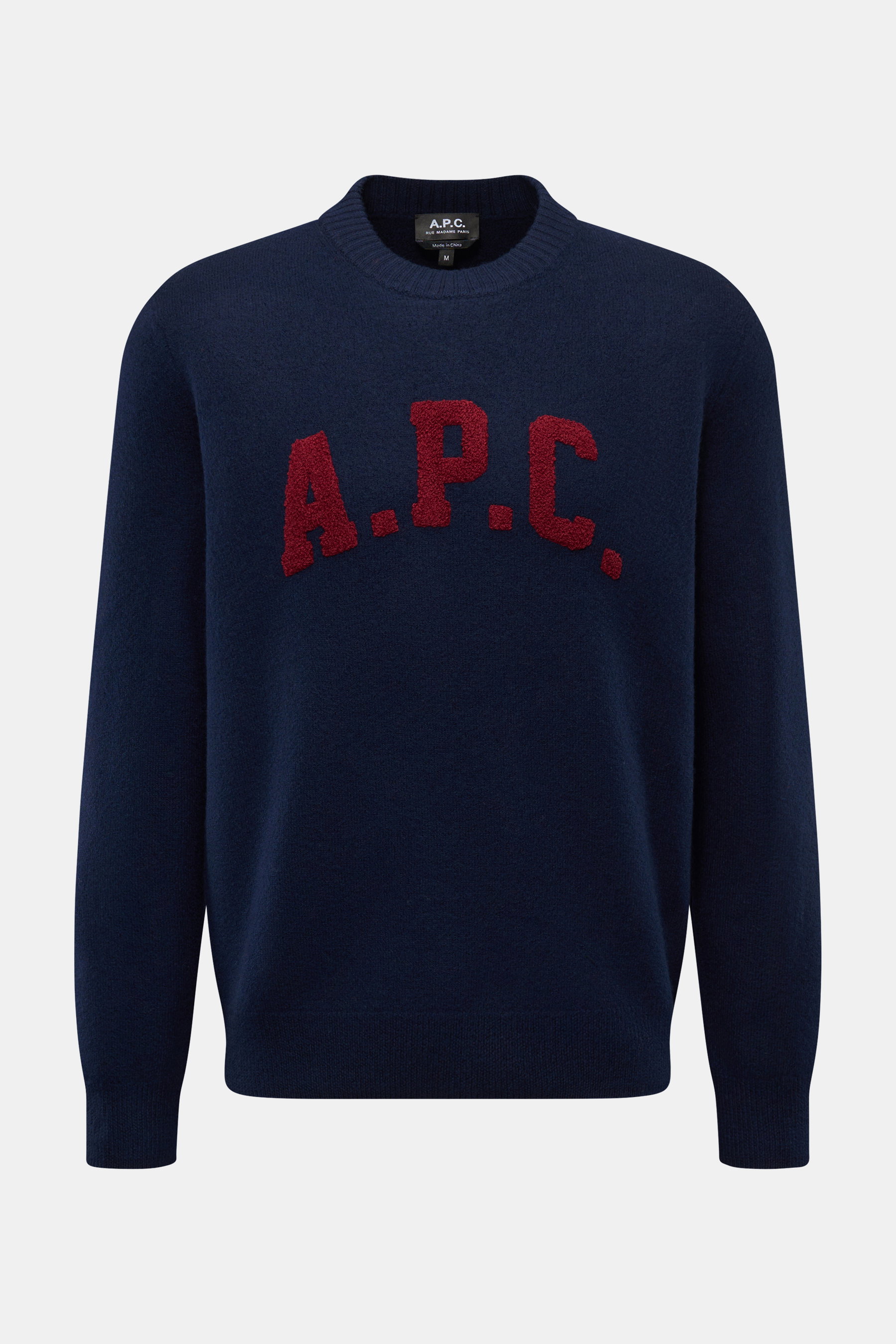 A.P.C. Rundhalspullover 'Jay' navy, frontale Ansicht, Slim Fit aus reiner Schurwolle mit rotem A.P.C. Logo und flexiblem Strickbündchen.