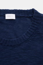 Close-up front view of the navy blue crew neck collar of the 04651/ A trip in a bag Crew neck jumper navy, showing fine knit texture and label. <p>Ideal for warmer days: This crew neck jumper, made from pure cotton by 04651/ A TRIP IN A BAG, is the perfec