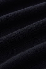 Close-up front view of the dark navy Filippo de Laurentiis Merino fine knit crew neck jumper showing its fine knit texture and soft fabric.

<p>A classic: This fine knit jumper by FILIPPO DE LAURENTIIS is luxuriously lightweight in pure Super 120's merino