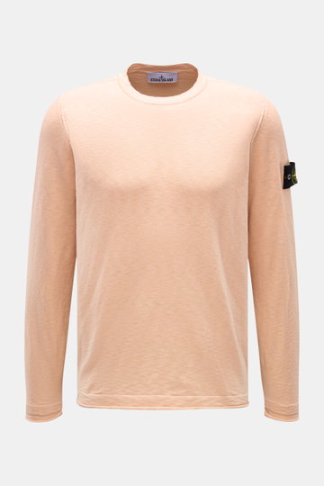 Stone Island Crew neck jumper apricot shown from the front, slim fit in a fine knit blend of cotton and microfiber with a soft feel, crew neck, rolled hem, strategically positioned seams, and signature compass badge on the left sleeve.
