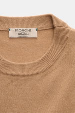Close-up front view of the Fioroni Cashmere crew neck jumper camel showing fine knit, slim fit, and flexible ribbed bands. Luxury you can feel: This jumper by FIORONI embodies the best of Italian knitwear and has an exceptionally soft feel that comes from