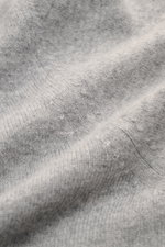 Close-up front view of Fioroni Cashmere crew neck jumper grey mottled showing fine knit texture and soft baby cashmere fibers.

Description: <p>Luxury you can feel: This jumper by FIORONI embodies the best of Italian knitwear and has an exceptionally soft