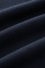 Close-up front view of B.F. Knitwear Crew neck jumper dark navy showing fine knit pure cotton fabric with soft feel and ribbed texture.

Description:
<p>A versatile essential for spring: This crew neck jumper in pure cotton by B.F. KNITWEAR enhances any w