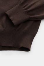 B.F. Knitwear Crew neck jumper dark brown shown from a close-up side angle, highlighting fine knit, ribbed bands, and soft pure cotton fabric. <p>A versatile essential for spring: This crew neck jumper in pure cotton by B.F. KNITWEAR enhances any wardrobe