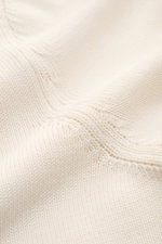 Close-up front view of Gran Sasso Crew neck jumper cream showing fine knit texture and ribbed bands in soft pure cotton fabric.

<p>Elegant cotton knitwear from Italy: This jumper from GRAN SASSO will be a great addition to your spring wardrobe, with its 