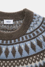 von Braun Cashmere crew neck jumper brown/smoky blue/cream patterned shown from a top-front close-up, featuring a classic Norwegian pattern and ribbed crew neck. Nordic tradition meets luxurious sophistication: With its classic Norwegian pattern and fine 