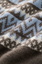 Close-up front view of the von Braun Cashmere crew neck jumper brown/smoky blue/cream patterned showing soft Norwegian knit pattern and texture.

<p>Nordic tradition meets luxurious sophistication: With its classic Norwegian pattern and fine cashmere from