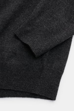 Close-up front view of the von Braun Cashmere crew neck jumper dark grey mottled, showcasing fine knit, soft pure cashmere, slim fit, flexible ribbed bands, and crew neck design. 

<p>A versatile essential for the colder months: This VON BRAUN fine knit