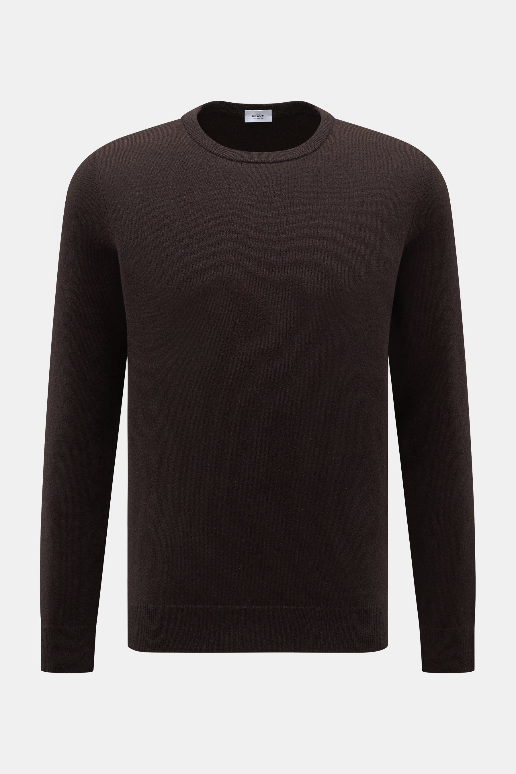 Front view of von Braun Cashmere crew neck jumper dark brown, a slim fit fine knit jumper made of pure Mongolian cashmere with flexible ribbed bands.

<p>A versatile essential for the colder months: This VON BRAUN fine knit jumper – made of luxurious Mong