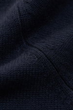 Close-up view of the navy fabric texture of the von Braun Cashmere crew neck jumper navy, highlighting its medium-fine knit and softness.