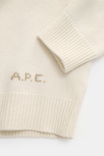 A.P.C. Rundhalspullover 'Edmond' creme aus reiner Wolle, Detailansicht von Ärmeln und Bund mit kontrastfarbenem Logo, Regular Fit, Rippbündchen.