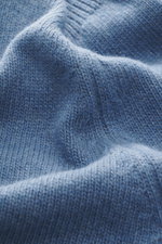 Close-up front view of the soft knitted fabric of the C.P. Company Crew neck sweater grey blue showing medium fine wool-microfiber knit.

Additional description:  
<p>Timeless casual favorite: The knit sweater from C.P. COMPANY combines pleasant warmth wi