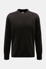 C.P. Company Rundhalspullover schwarz aus Baumwoll-Chenille, Frontansicht mit Rundhalsausschnitt, Raglanärmeln, Zipper-Tasche am Ärmel, weicher Griff.