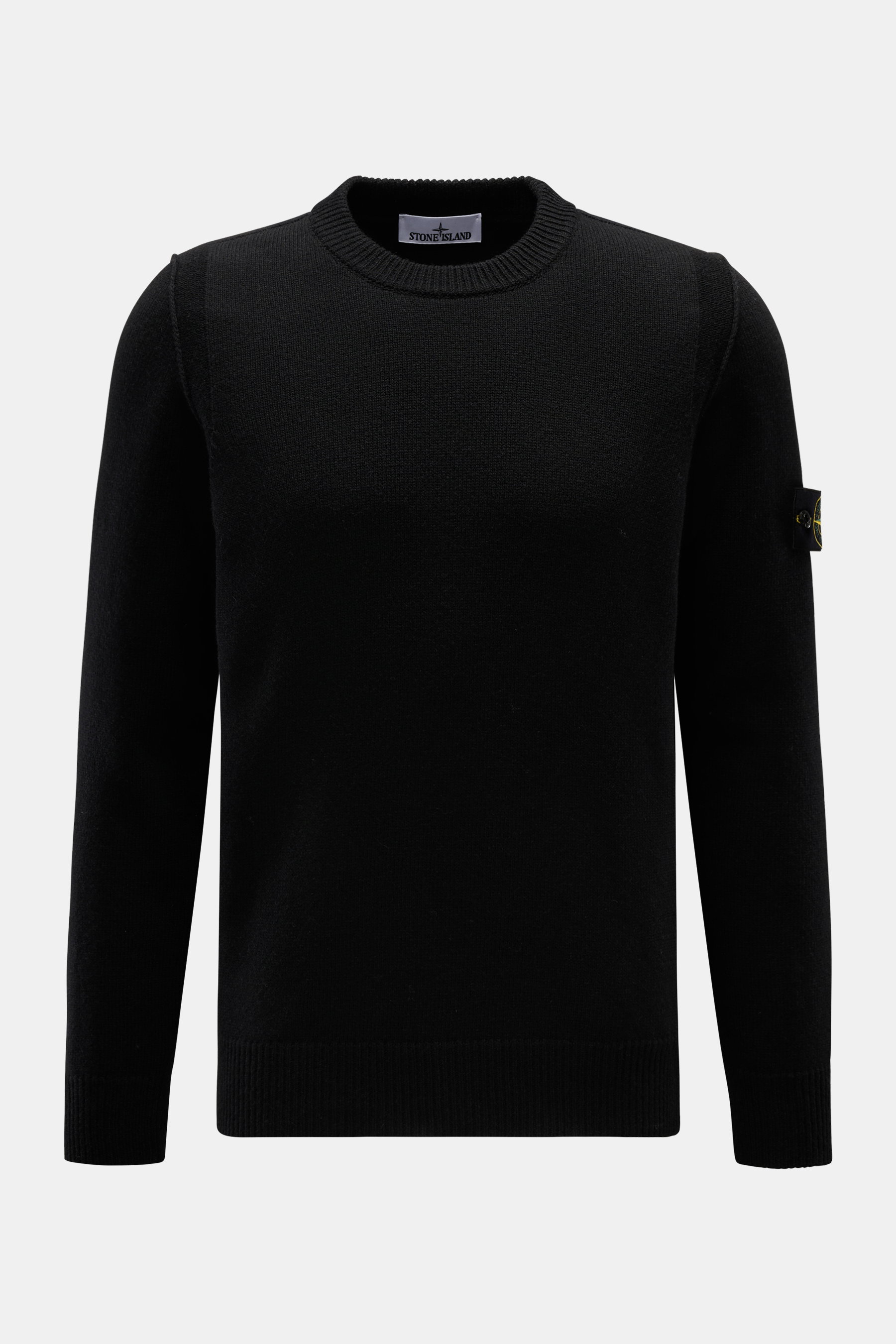 Stone Island Crew Neck Sweater 'Lambswool' Black shown front view, slim fit, crew neckline, ribbed cuffs, compass badge on sleeve, soft virgin wool blend with medium-fine knit texture and contrasting stripes, stylish cold-season essential.
