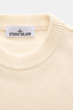 Stone Island Crew Neck Sweater 'Lambswool' creme shown from above, highlighting the ribbed crew neckline and soft virgin wool knit. Stylish essential for the cold season: This casual sweater by STONE ISLAND made of a warm wool blend impresses with distinc