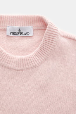 Close-up front view of Stone Island Crew Neck Sweater 'Lambswool' rose showing ribbed crew neckline, soft virgin wool knit texture, and Stone Island label.  

Description:  
<p>Stylish essential for the cold season: This casual sweater by STONE ISLAND mad