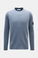 Stone Island Crew Neck Sweater 'Lambswool' grey blue shown from the front, slim fit with ribbed cuffs and compass badge.