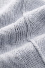 Close-up of the Stone Island Crew Neck Sweater 'Lambswool' smoky blue showing detailed link-knit texture from a front perspective.

Description: 
<p>Stylish essential for the cold season: This casual sweater by STONE ISLAND made of a warm wool blend impre