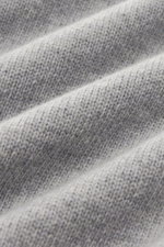 Close-up front view of Stone Island Crew Neck Sweater 'Lambswool' Light Grey showing soft, medium-fine knit texture in virgin wool and microfiber.