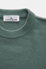 Stone Island Crew Neck Sweater 'Lambswool' grey green shown in close-up from above, highlighting the ribbed crew neckline and fine knit texture. Stylish essential for the cold season: This casual sweater by STONE ISLAND made of a warm wool blend impresses
