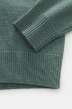 Close-up top-down view of the Stone Island Crew Neck Sweater 'Lambswool' grey green sleeve and body showing soft medium-fine virgin wool knit with ribbed cuffs and contrast knit stripes. 

Description: <p>Stylish essential for the cold season: This casual