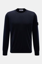 Front view of Stone Island Merino Crew Neck Sweater Navy, made of pure merino wool with fine knit, slim fit, crew neckline, ribbed cuffs, and compass badge on upper arm.