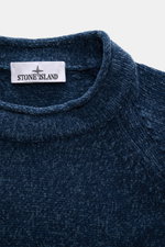 Close-up front view of Stone Island Crewneck Sweater 'Chenille' Gray Blue showing soft cotton chenille texture and rolled edge neckline. 

<p>Stay warm and stylish through winter with STONE ISLAND: This sweater made of soft cotton chenille combines innova