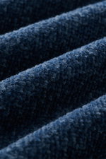 Close-up, angled view of Stone Island Crewneck Sweater 'Chenille' Gray Blue showing soft cotton chenille texture with coarse knit pattern.  

Description: <p>Stay warm and stylish through winter with STONE ISLAND: This sweater made of soft cotton chenille