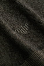 Close-up front view of the Emporio Armani Crew Neck Sweater Grey Brown showing fine knit texture and subtle logo embroidery.

Description: 
<p>Versatile companion: The lightweight crew neck sweater made of pure new wool from EMPORIO ARMANI impresses with 