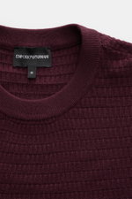 Emporio Armani Short sleeve jumper burgundy shown from a top-front close-up, highlighting crew neck, textured pure virgin wool knit, ribbed bands, and logo stitching on the hem. Versatile companion: This lightweight short sleeve jumper in pure virgin wool