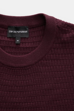 Emporio Armani Short sleeve jumper burgundy shown from a top-front close-up, highlighting crew neck, textured pure virgin wool knit, ribbed bands, and logo stitching on the hem. Versatile companion: This lightweight short sleeve jumper in pure virgin wool